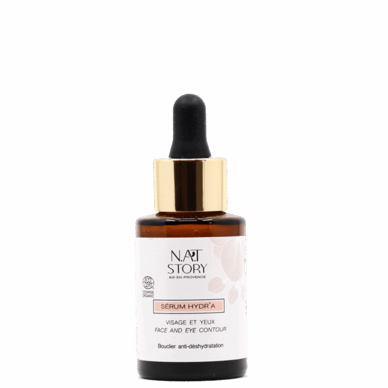 flacon de serum en verre ambré sur fond blanc